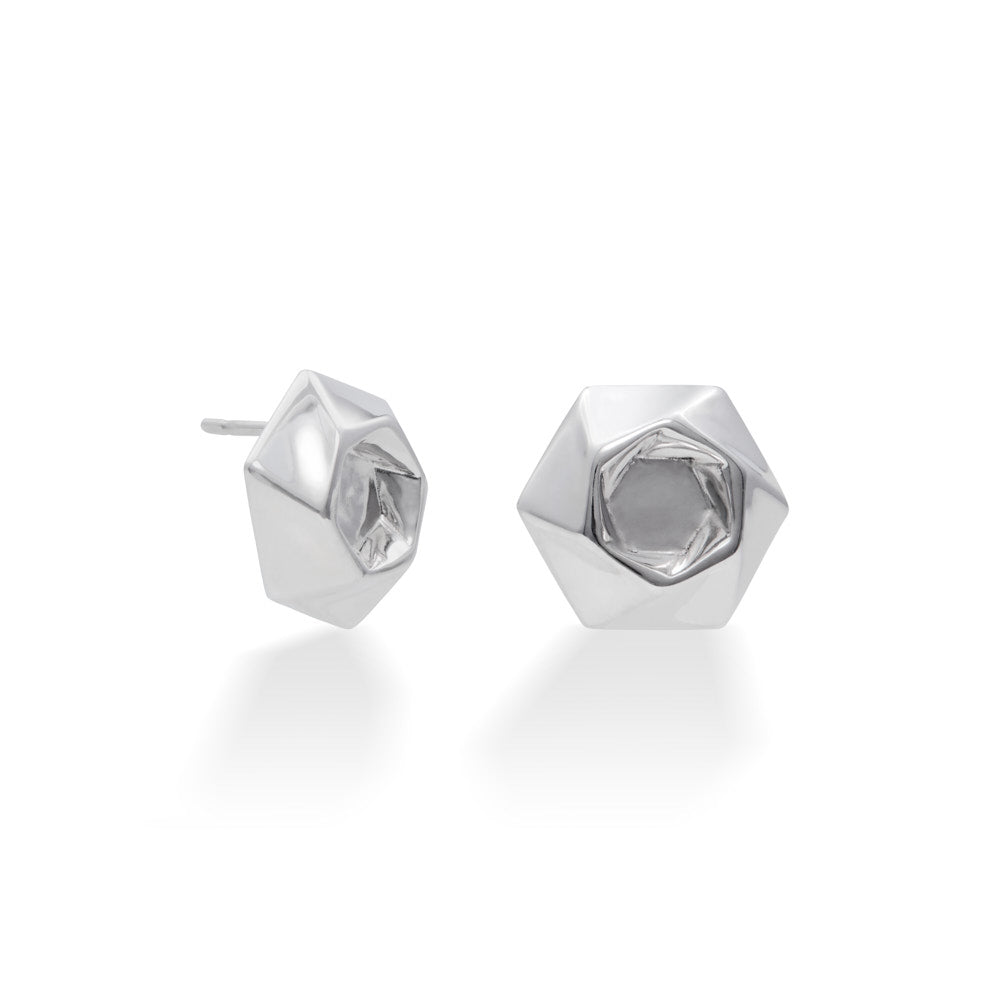 A pair of sterling silver Aperture Earrings against a white background. The earrings feature a twisty hexagonal design, and measure about 15.7mm from flat to flat. At 7 grams each, they're eminently comfortable to wear, but still make a bold statement.