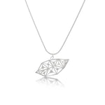 An image of the LīF Necklace, hanging against a white background, showing the angle at which it's designed to hang. 