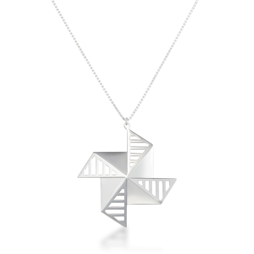 An image of the sterling sliver Windmolen Necklace hanging straight on over a white background. The necklace has a unique windmill-inspired design, almost like a pinwheel of silver on a chain. It's a large piece at 60mm wide, but it's been designed to be a mere 23 grams in weight. The angles ensure this piece stays perfectly rigid, with comfortable corners despite its almost shuriken-like appearance. Like all of our pieces, this is meant to last a lifetime. A piece of which you can be truly proud.