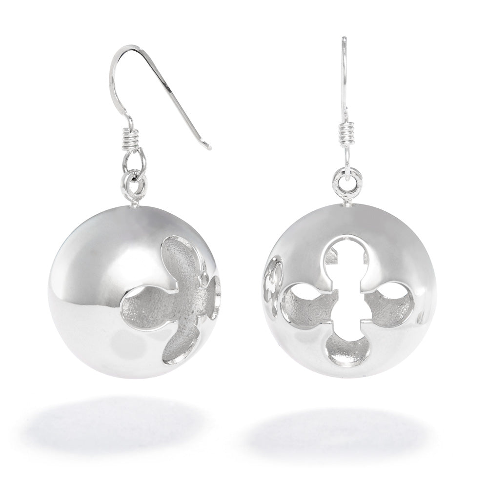 A photo of our Cross Ball Earrings against a white background. The earrings are 20mm spheres of thick sterling silver with a cutout of a cross design with circular points.