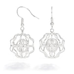 A product photo of our Supernova Earrings against a white background. The earrings are irregular wire shapes with a sphere shape in the center and a jagged shape on the outside. They hang from Argentium hooks. 