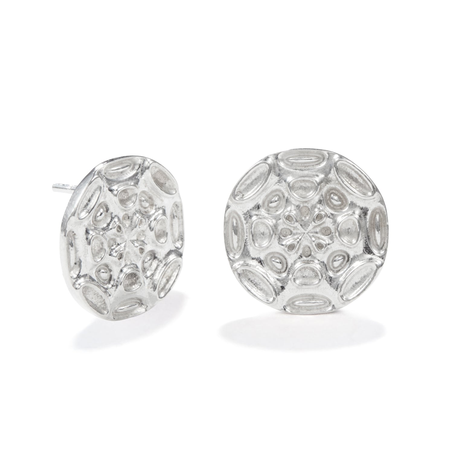 A product photo of our Moonscape Earrings in front of a white background. The earrings are 18mm round disc stud earrings with a textured pattern reminiscent of craters. 
