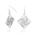 An image of the Square Spiral Earrings over a white background. The sterling silver earrings are a spiral pattern with square sides. 